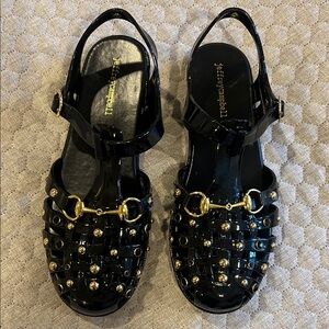 Jeffrey Campbell Black and Gold Sandals with Luxe Appeal